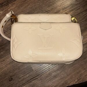 Louis Vuitton Ivory Embossed Clutch